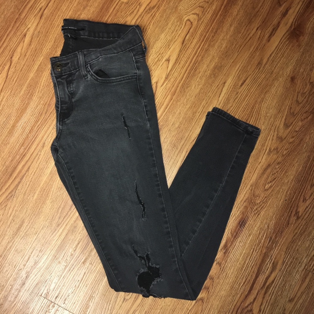 Flying monkey, black ripped jeans